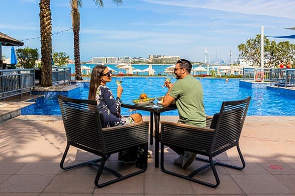 Poolside dining overlooking the beach