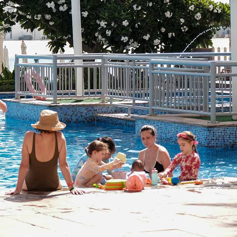 Family on the poolside